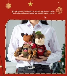 Detailed view of Christmas reindeer and Santa gift bags with clear window and plush texture