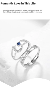 Macro shot of S925 sterling silver couple rings with blue zircon and moon star design