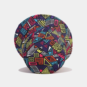 Close-up of reversible bucket hat with colorful 3D digital tribal pattern and wide brim