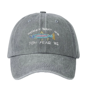 Washed dark grey baseball cap with Women Want Me Fish Fear Me embroidery on white background
