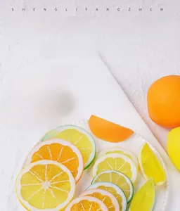 Macro detail of high-quality PVC lemon and orange slices with realistic fruit pulp texture