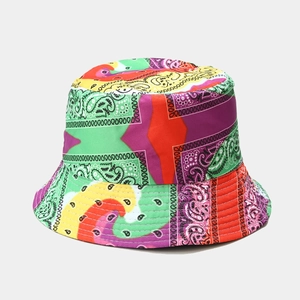 Close-up of vibrant paisley patchwork tie-dye pattern on reversible cotton bucket hat