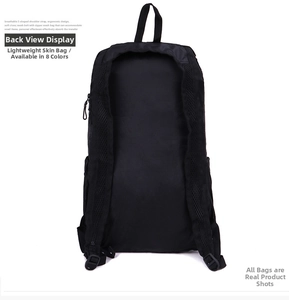 Detail of ergonomic S-shaped mesh breathable shoulder straps on lightweight black folding bag