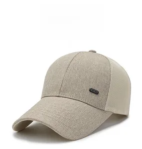 Detailed shot of breathable beige mesh baseball cap with Trends metal side emblem