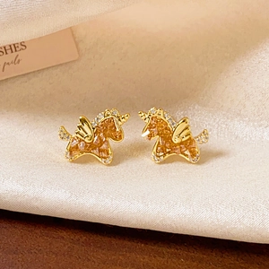 Boucles d'oreilles licorne plaquées or 18k avec cristaux champagne sur soie