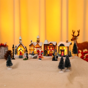 10-piece light-up Christmas village set with Santa figurines and mini houses