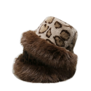 Close-up of leopard print faux fur winter bucket hat with plush brown brim detail