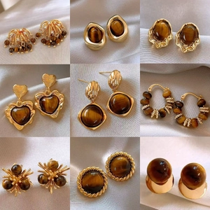 Set of 9 vintage geometric tiger eye earrings in gold finish with silk background