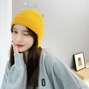 Korean style yellow ribbed knit ear protection hat for winter windproof warmth