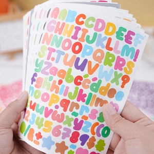 Close-up of colorful 0.5-inch alphabet and number stickers for scrapbooking