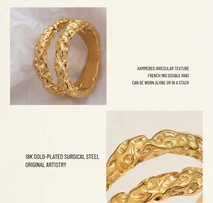 Close-up of double-layer titanium steel ring with irregular hammered gold texture