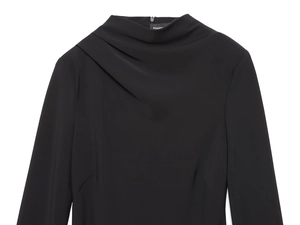 Detail of elegant black dress showing draped neckline and high-quality elastic fabric texture