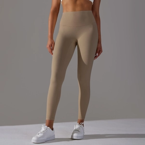 Detail of high waist yoga pants showing elastic nude-feel fabric and seamless design