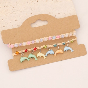 Ensemble de bracelets bohèmes tressés main avec pendentifs dauphins et perles de mer