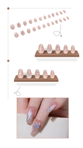 Detailed view of press-on nails featuring 3D blue butterflies and silver glitter gradient