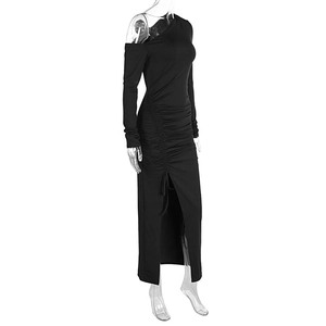 Detail of slim fit one-shoulder black dress featuring side drawstring and high slit hem