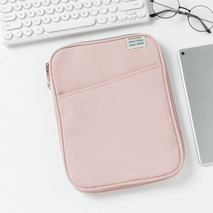 Pink shockproof 11-inch laptop sleeve featuring a front pocket and soft nylon material