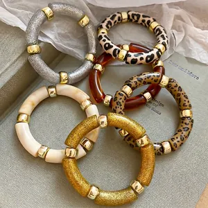 6-piece iridescent acrylic geometric bangles set with leopard print and glitter finishes