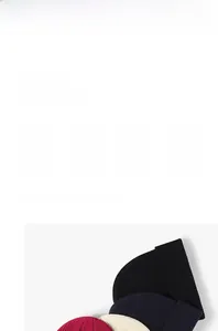 Detail of warm rib-knit beanies in various colors showing thick premium fabric texture