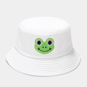 Close-up of cute green frog embroidery on premium white cotton sun bucket hat