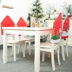 Christmas chair covers featuring Santa and reindeer prints for holiday dining room decor
