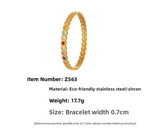 Macro view of 0.7cm gold-plated stainless steel bangle with colorful zircon inlays