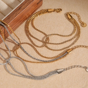 Three-layer stainless steel multi-strand bracelet with PVD gold plating and lobster clasp