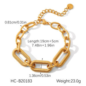 Detail view of gold stainless steel butterfly chain with size measurements and weight info