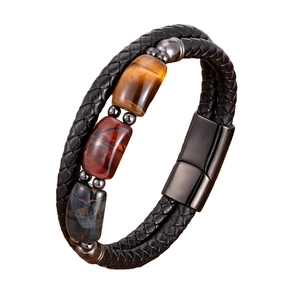 Braided leather bracelet featuring triple tiger eye stones and magnetic metal clasp
