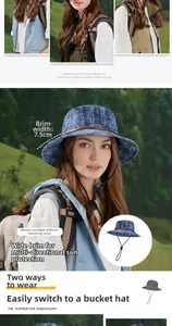 Detail of blue denim bucket hat with leather trim and adjustable chin strap feature