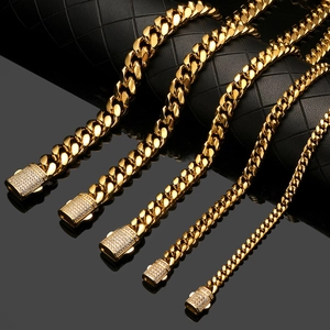 Detailed comparison of gold-plated Cuban chains in various thicknesses with diamond clasps