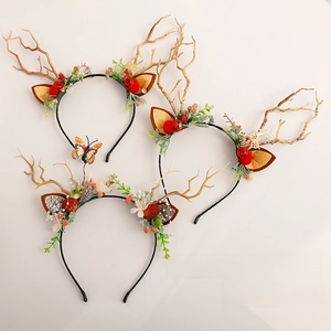 Christmas reindeer antler headbands with festive bells, butterflies and red berry decors