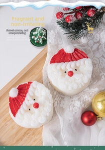 Detail of Santa Claus scented candle with creamy 3D carving texture on wooden tray