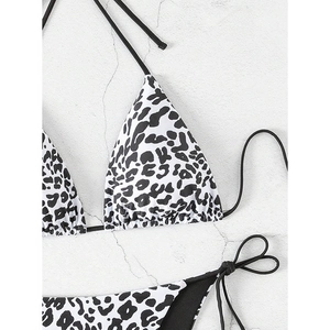 Detailed view of leopard print bikini set showing high-quality stitching and tie strings