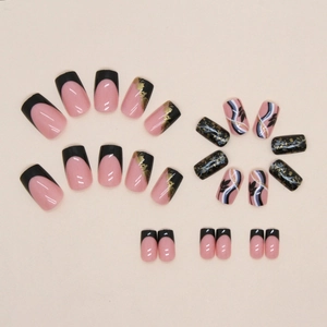 24-piece press-on nails set featuring black and pink French tips with gold foil and leaf patterns