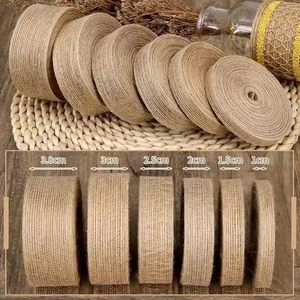Macro shot showing six sizes of natural jute ribbons from 1cm to 3.8cm for DIY gift wrapping