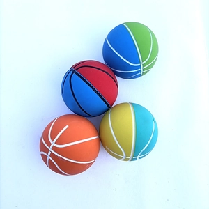 Detailed view of four colorful 6cm high-elastic mini basketballs for stress relief