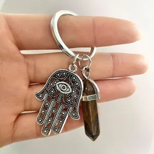 Tiger eye crystal hexagonal point keychain with Hand of Fatima and Evil Eye charm