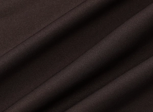 Detailopname van de donkerbruine twill-stofstructuur met elegante geplooide details