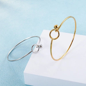Minimalist gold and silver stainless steel bangles with circle and bead closure design