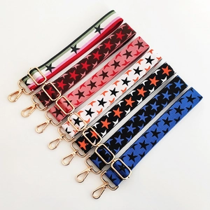Variety of colorful star patterned wide shoulder straps with gold metal hooks for bags