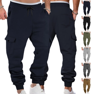 Detail view of multi-pocket cargo joggers featuring drawstring waist and ribbed cuffs