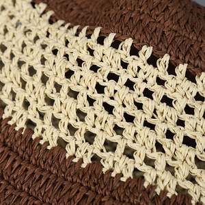 Handwoven hollow out straw bucket hat with striped texture for summer sun protection