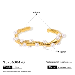 Detailed size specifications for the gold stainless steel lava cuff with white pearls