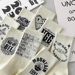 Breathable cotton crew socks for men featuring minimalist vintage embroidery patterns