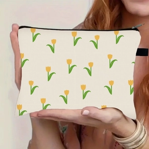 Neceser floral con estampado de tulipanes amarillos y cremallera negra de viaje