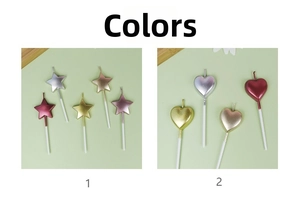 Detailed view of gold and silver heart and star cake candles with metallic coating