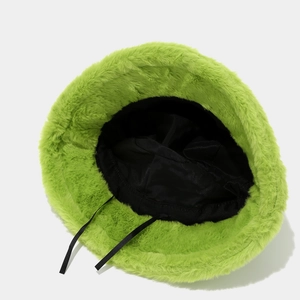 Lime green faux fur bucket hat interior view with black lining and adjustable ribbons