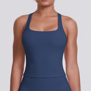 Detail of navy blue racerback sports bra showing square neck and matte elastic fabric