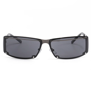 Y2K vintage hollowed-out sunglasses with dark grey lenses and metallic frame in front view